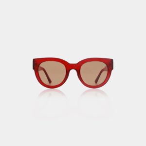 LILLY - Red Transparent sunglasses feature round frames and brown tinted lenses, inspired by Estonian design and photographed against a plain white background. Gate21.ee