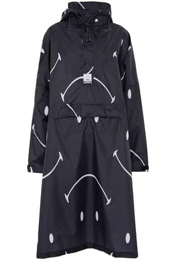 The Digi Spring raincoat is long, black, and hooded, with bold white curved arrows and dots. It features a front pocket and a collar label. Gate21.ee