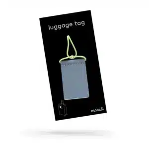 A neon yellow luggage tag with a matching loop is shown on black packaging labelled "Luggage Tag" in white, featuring the brand name march and a suitcase icon—ideal for curated concept stores or stylish gift shops. Gate21.ee