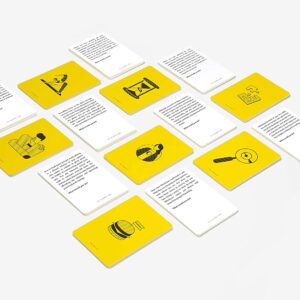 Thirteen cards from the Dilemmas Game are displayed on a white surface. Some are yellow with black icons—such as a magnifying glass, computer, scales, and puzzle pieces; others feature black text on white backgrounds suggesting unique gift ideas. Gate21.ee