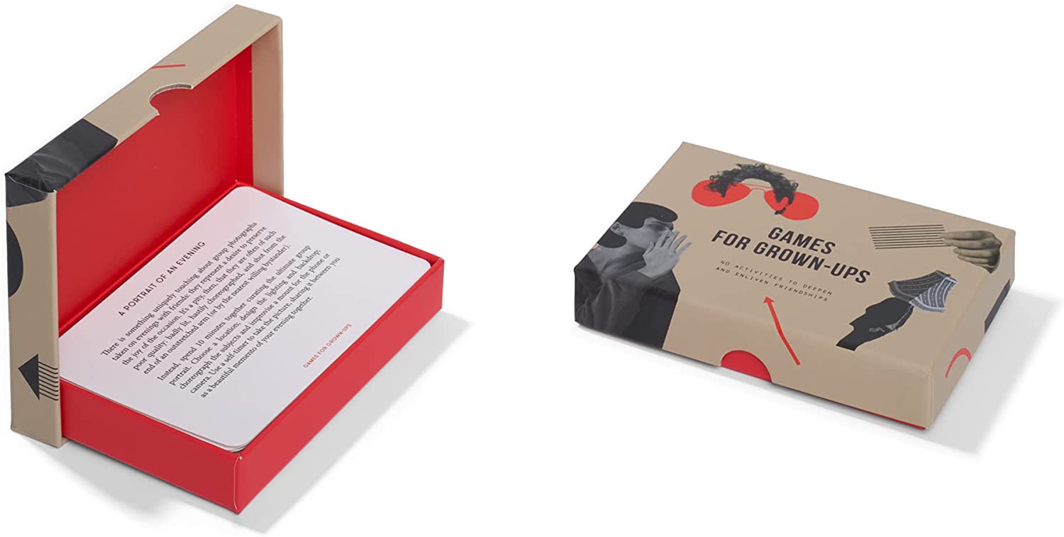A closed and open box of Games for Grown-ups card game are shown side by side, revealing a stack of cards with text and stylish abstract packaging—an ideal unique find for anyone exploring gift or shopping spots in Tallinn. Gate21.ee