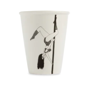 The Pole Dancer Cup is a white mug showcasing a black illustration of a woman in striped clothing and knee-high socks performing an upside-down pole dance—an eye-catching piece of Estonian design. Gate21.ee