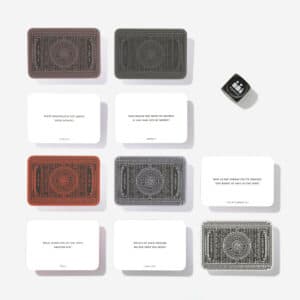The Parents & Teenagers Game features nine cards, arranged in a grid with some face up and some face down, and includes a black six-sided die with white spots placed to the upper right of the display. Gate21.ee