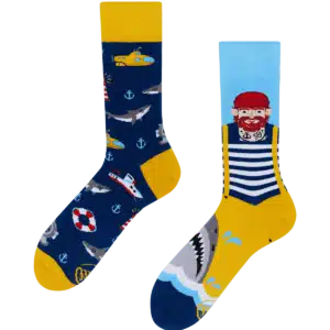 Fisher's Tale: one sock with submarines, anchors, sharks, and life buoys on navy; the other with a sailor in a water scene on light blue and yellow—a vibrant Estonian design perfect for unique gift seekers!. Gate21.ee