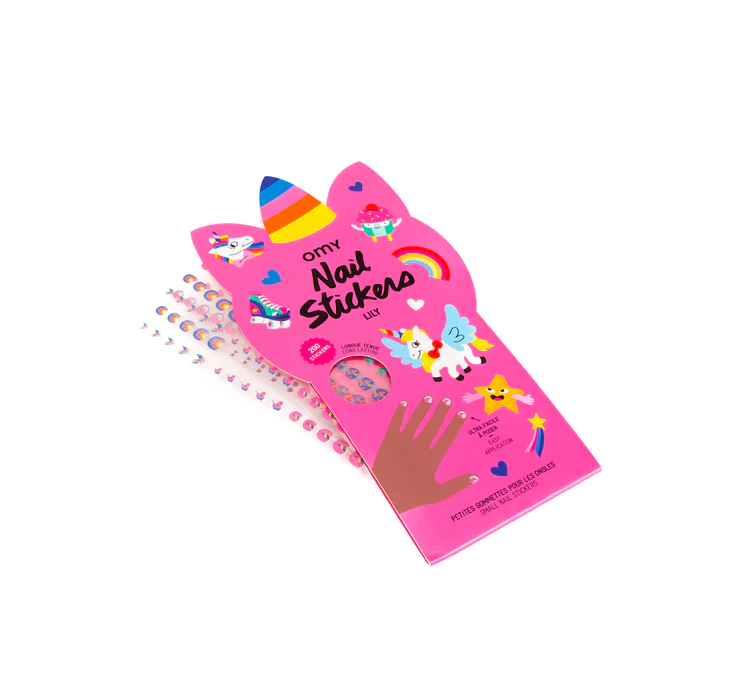 A pink package labelled "Unicorn - Nail Stickers" features unicorn and rainbow graphics. Several sheets with colourful designs like hearts, stars, and unicorns are partially visible—ideal for gift shop or concept store displays. Gate21.ee