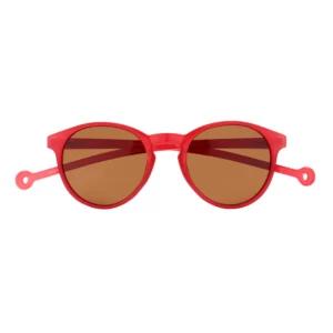 The "Isla" Strawberry Sunglasses feature round red frames and brown tinted lenses, shown on a white background. The temples are styled with unique circular holes at the tips. Gate21.ee