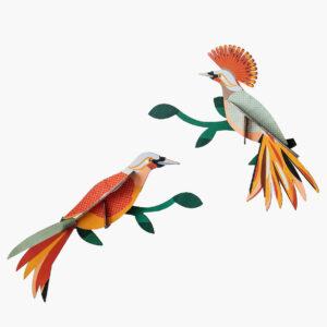 Paradise Bird Obi features two colourful paper birds perched on green branches, with striking orange, yellow, and red patterns. Ideal for Tallinn shopping or unique gifts, this vibrant piece brightens any shop or collection. Gate21.ee