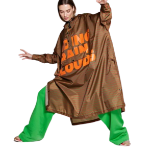A person poses against a plain white background wearing bright green wide-legged trousers, inspired by the Breton Green Diary—a look that channels the curated, unique style of a concept shop. Gate21.ee