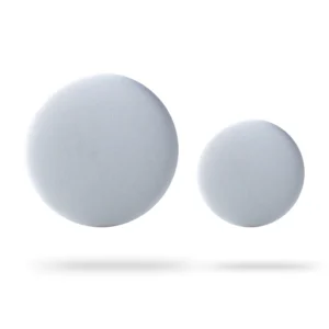 Two grey circular foam pads, one larger and one smaller, are shown against a white background with subtle shadows beneath them—an example of curated Estonian design perfect for any modern concept shop. Gate21.ee