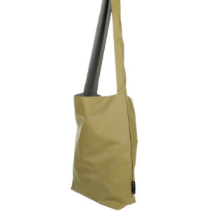The Feel Good Bag - Prairie Sand is a yellow fabric tote with a long, wide strap, featuring curated Estonian design. It stands upright and is photographed against a plain white background. Gate21.ee