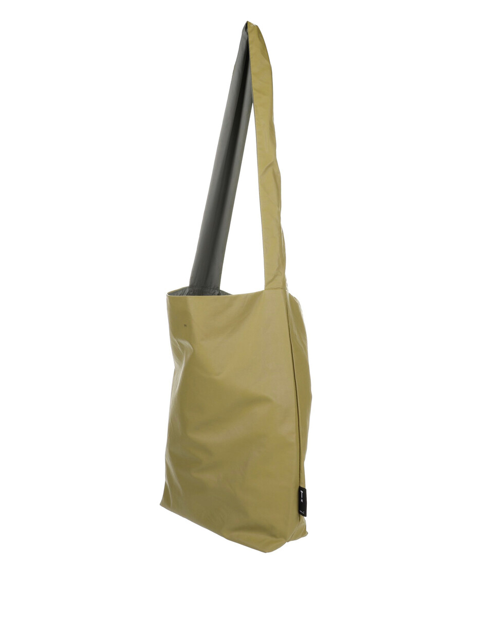 The Feel Good Bag - Prairie Sand is a yellow fabric tote with a long, wide strap, featuring curated Estonian design. It stands upright and is photographed against a plain white background. Gate21.ee