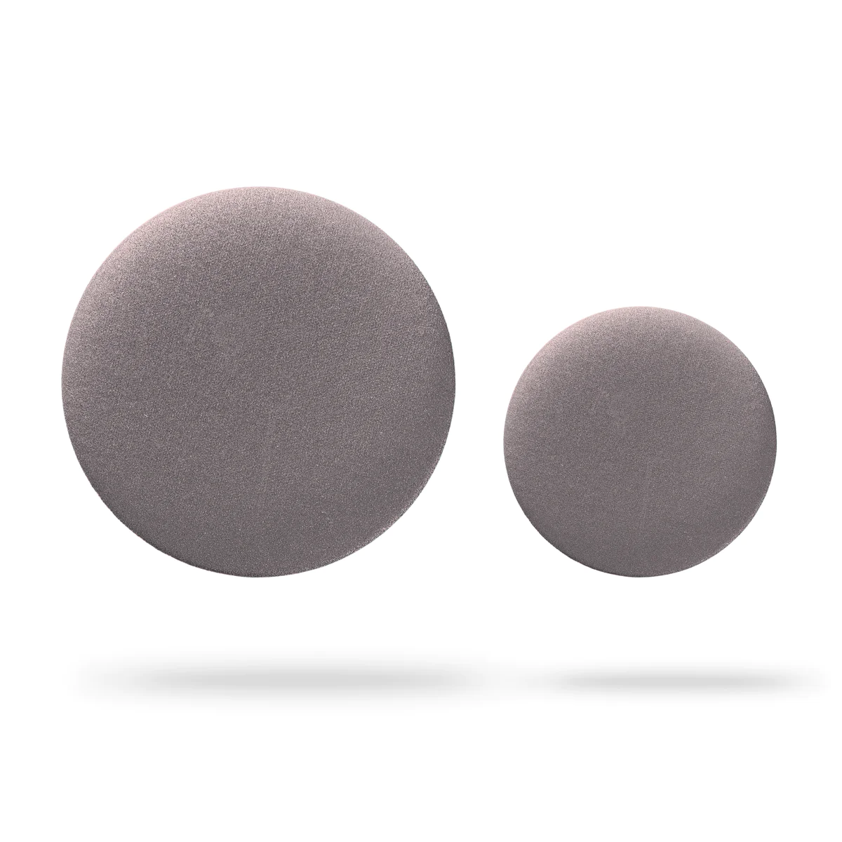 Two round, flat, metallic pink foam pads of different sizes are displayed on a white background with soft shadows—an example of minimalist design found in the Double - Metallic Pink collection. Gate21.ee