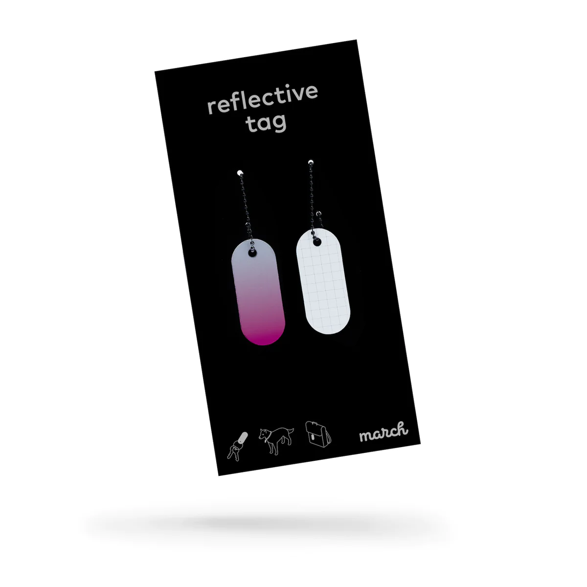 The Reflective Tag - Pink Fade comes in black packaging and features two oval tags with ball chains: one tag fades from pink to white, the other is white with a grid pattern. Icons and the brand name "march" appear at the bottom&mdash;ideal for creative concepts. Gate21.ee
