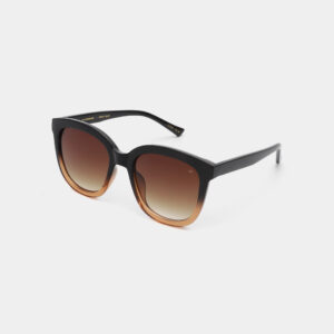 The BILLY - Black Brown Transparent sunglasses feature black frames fading to brown with gradient brown lenses. Shown on a white background, they showcase Estonian design&mdash;ideal for concept shops. Gate21.ee