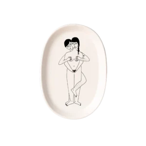 The Faces - Tray is an oval ceramic platter from a Tallinn concept store, featuring a minimalist black line drawing of two nude figures embracing on a plain white background. Gate21.ee