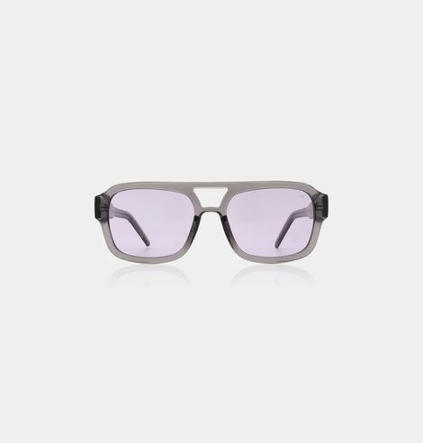KAYA - Grey Transparent: Rectangular sunglasses with grey transparent frames and light purple tinted lenses, shown front-facing on a plain white background—an eye-catching accessory or a memorable gift from your Tallinn shopping adventure. Gate21.ee