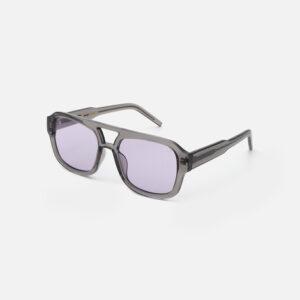 KAYA - Grey Transparent: Rectangular sunglasses featuring translucent grey frames and light purple-tinted lenses, showcasing curated Estonian design. Displayed on a plain white background. Gate21.ee