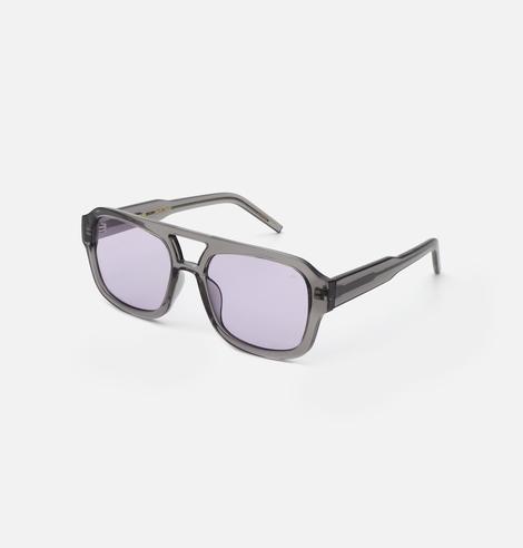 KAYA - Grey Transparent: Rectangular sunglasses featuring translucent grey frames and light purple-tinted lenses, showcasing curated Estonian design. Displayed on a plain white background. Gate21.ee