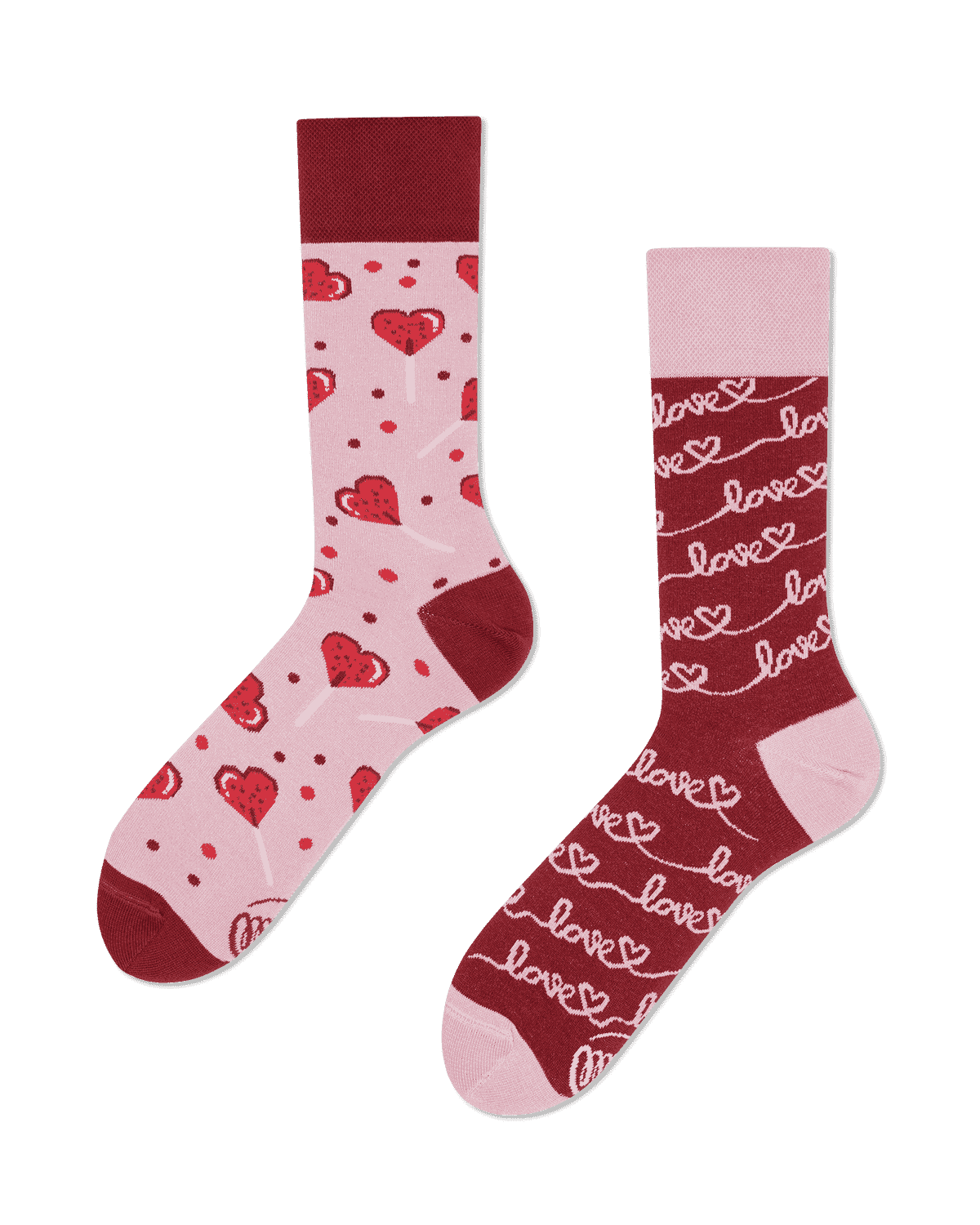 Love Story features two mismatched socks: one pink with red hearts and polka dots; the other red with pink "love" text and hearts in lines. Both have red toes, heels, and cuffs—a fun, uniquely designed gift. Gate21.ee