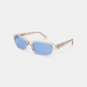 The WILL - Champagne sunglasses feature rectangular translucent beige frames and blue-tinted lenses, elegantly displayed on a white background—an ideal stylish choice for any Tallinn shopping concept shop. Gate21.ee
