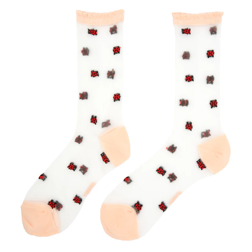 Ladybird - Transparent Socks: Sheer white socks with peach toes, heels, and cuffs, featuring a repeating red and black ladybird pattern—an ideal unique find for Tallinn shopping or at a local concept shop. Gate21.ee
