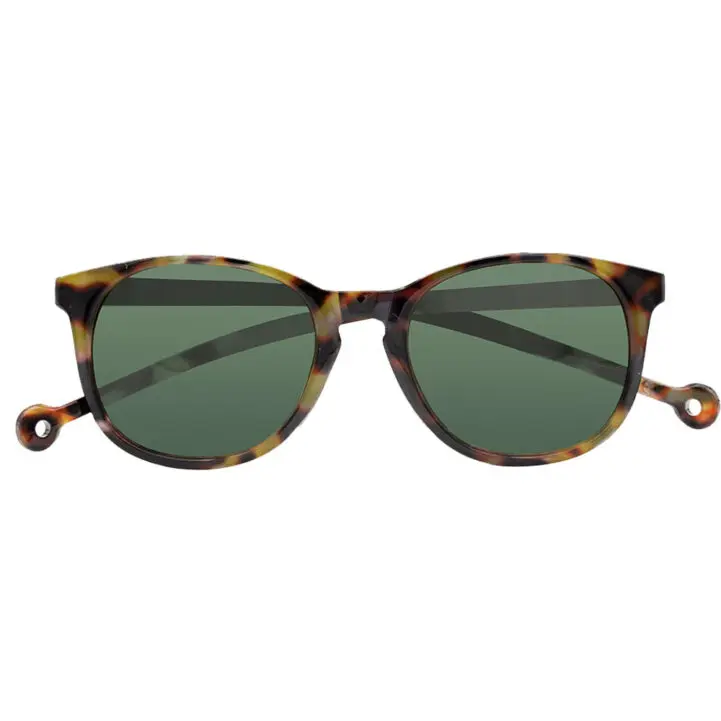 The "Arroyo" Tortoise Sunglasses feature round tortoiseshell-patterned frames and dark green lenses, shown front-facing against a white background, perfect for those seeking standout eyewear. Gate21.ee