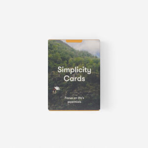 A box labelled Simplicity Cards sits against a white background, featuring a small house among green trees—an Estonian-designed item ideal for Tallinn shopping enthusiasts. Gate21.ee