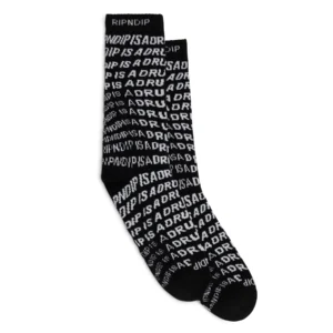 The Drug From God Socks - Black feature white "RIPNDIP IS A DRUG" text in various sizes repeated across the black fabric, with the RIPNDIP logo near the top—an ideal addition to any curated gift shop. Gate21.ee