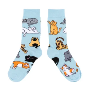 Meow - Cotton Socks: Light blue socks adorned with playful cartoon cats—ideal for cat lovers seeking a whimsical touch for their collection or a fun find at your favourite gift shop. Gate21.ee
