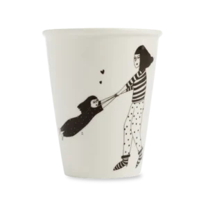 The Spinning Around Cup from a Tallinn concept shop features a black-and-white illustration of a woman in stripes spinning a child in polka-dot pyjamas with heart accents&mdash;an ideal unique find for your Tallinn shopping. Gate21.ee