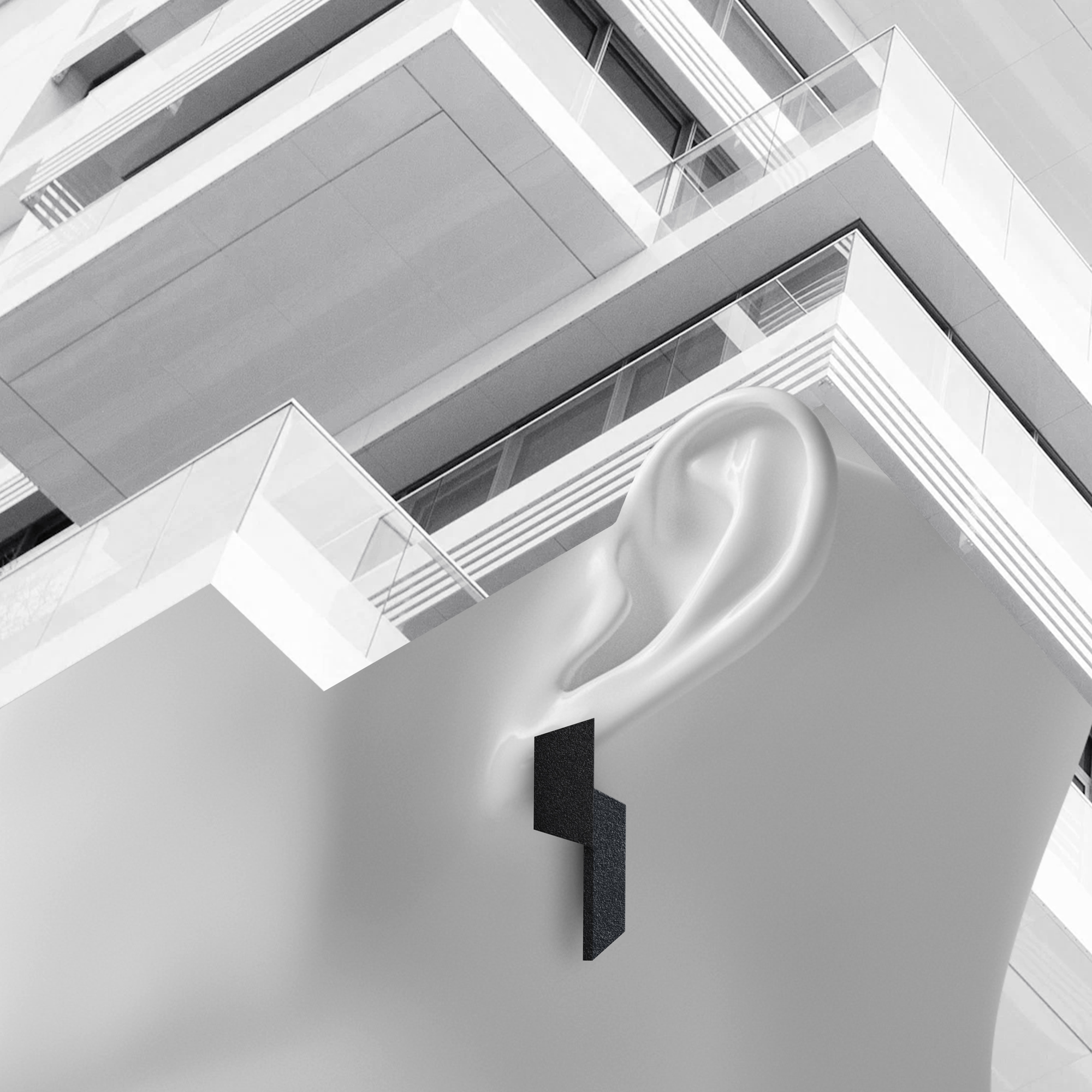 A geometric black earring is worn on a smooth, stylised white ear, set against the angular lines of a modern building—an aesthetic perfect for a concept shop seeking unique ideas in monochrome design. Gate21.ee