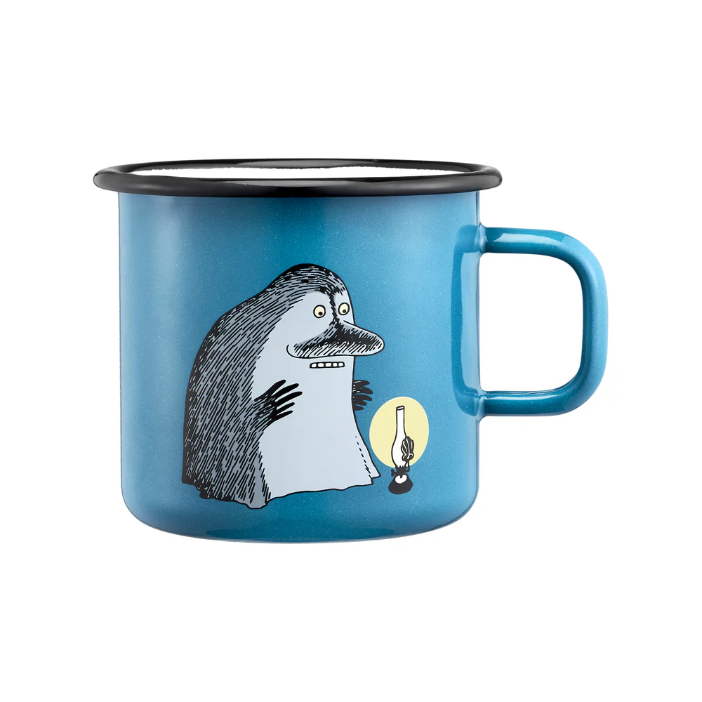 The Groke - Moomin blue enamel mug (550ml) features a cartoon creature with shaggy fur and a moustache by a lit oil lamp, has a black rim, large handle, and metal construction. Gate21.ee