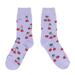 Cherries - Cotton Socks: Light purple socks with a playful red cherry pattern and green stems, shown flat on a white background. A fun addition to any gift shop or concept store collection. Gate21.ee