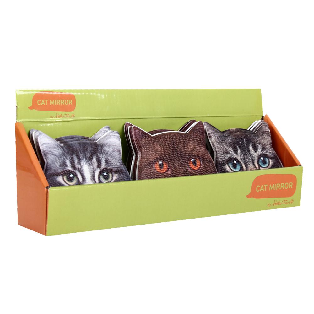 The Travel mirror - Cats features three cat-head-shaped mirrors with realistic grey and brown fur faces, displayed in a green and orange box, making this playful Estonian design ideal for gift shops and unique gifting ideas. Gate21.ee