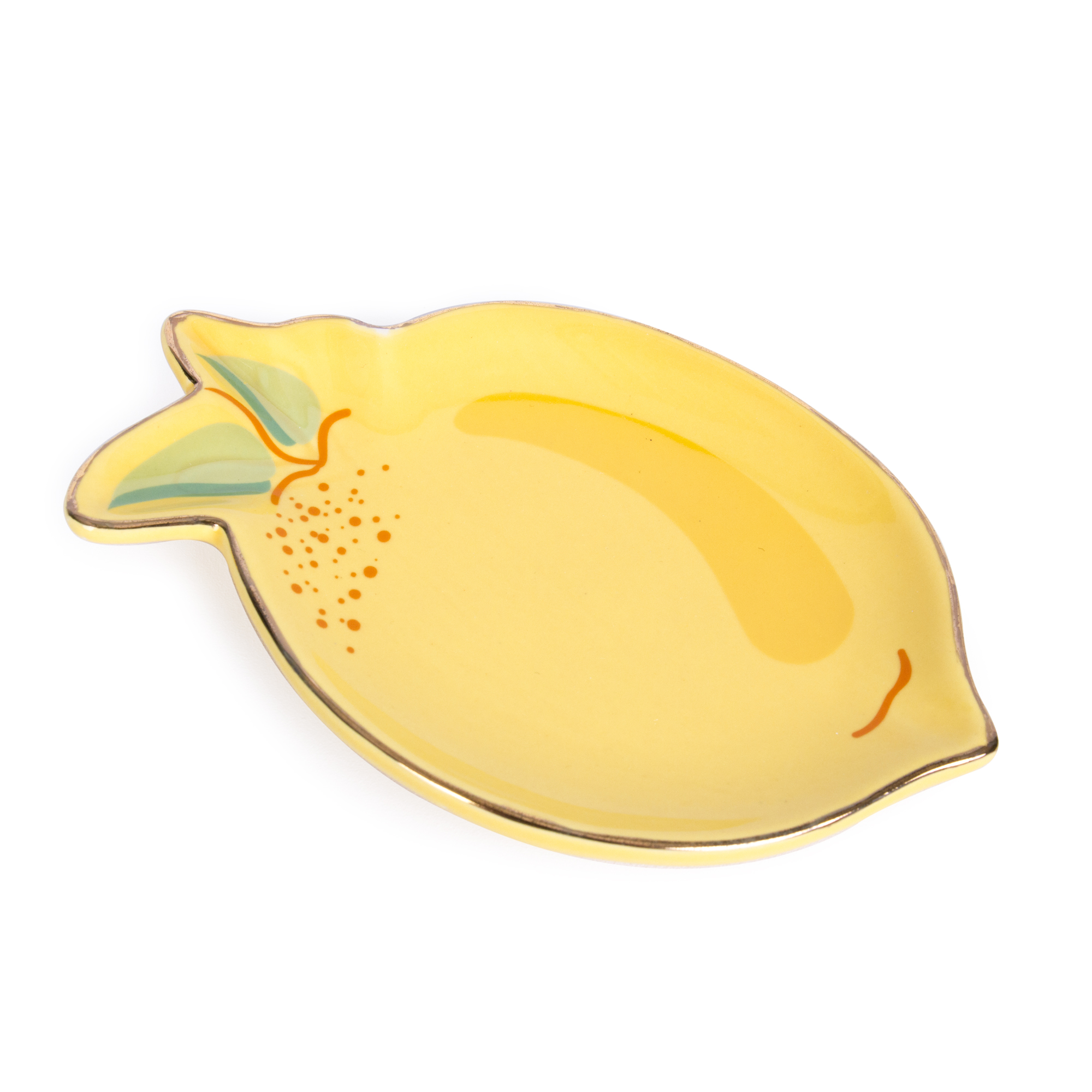 The Lemon - Jewellery Plate is a ceramic dish shaped and painted like a yellow lemon with green leaves and orange speckles, ideal for adding a unique Tallinn shopping touch. Photographed on a white background. Gate21.ee