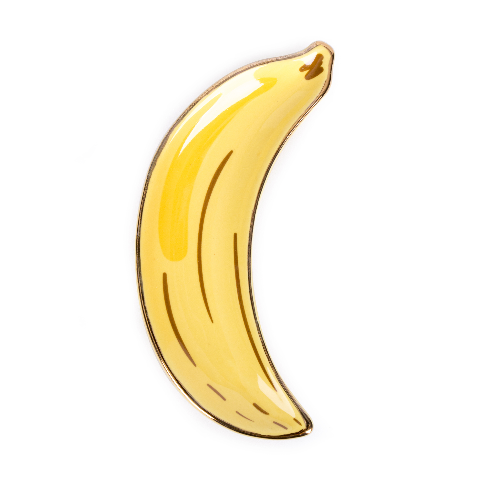 The Banana - Jewellery Plate features a simple, cartoon-style illustration of a curved yellow banana with brown lines on a white background, inspired by curated Estonian design. Gate21.ee