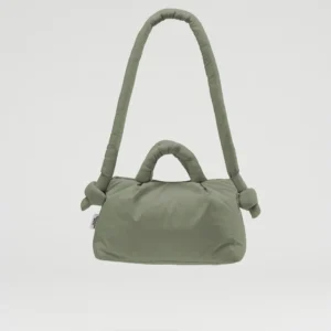 The Mini Ona Soft Bag - Sage is a soft, padded olive green handbag with short and long handles, featuring knotted details near the long strap. Shown against a plain white background, it's perfect for shopping in Tallinn. Gate21.ee