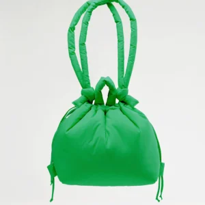 The Ona Soft Bag - Green is a padded drawstring bag with two thick, looped handles. It features a smooth texture and gathered details, photographed against a plain light background for a curated look. Gate21.ee