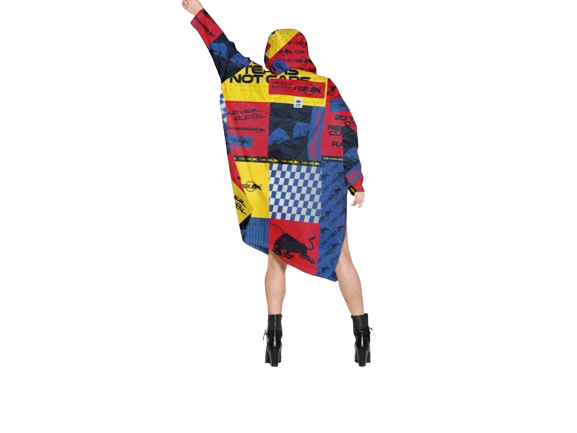 A person wearing the Box Box - Special Edition, a colourful oversized hoodie with red, yellow, blue, and black blocks, stands with one arm raised—an ideal pick for those exploring unique Tallinn shopping or fresh concept shop trends. Gate21.ee