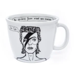 The Glam Rocker - Big cup is a white ceramic mug from a curated Tallinn shop, featuring a black line lightning bolt face. Inside it reads "the spiders from mars are coming" with a speech bubble saying "for tea. Gate21.ee