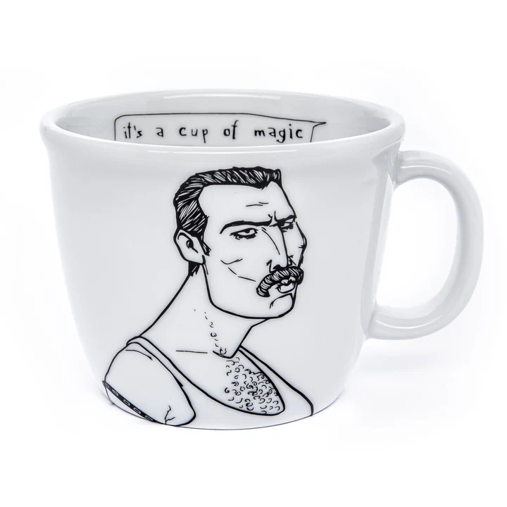 The Mercurial Champion - Big Cup is a white ceramic mug featuring a black line drawing of a moustached man with short hair in a vest. "It's a cup of magic" is printed inside—perfect for fans of Estonian design or Tallinn shopping treasures. Gate21.ee