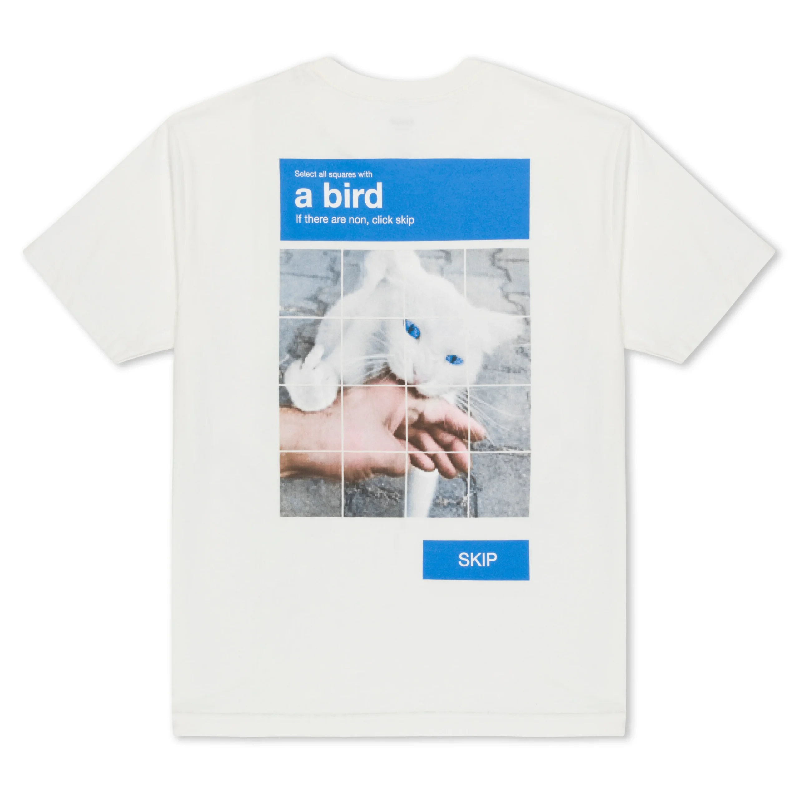 A Bird Tee - Bone: A playful white T-shirt with a CAPTCHA-style grid showing a white cat biting a hand, labelled "Select all squares with a bird" and blue SKIP button—a fun Estonian design for Tallinn shopping or unique gift shop finds. Gate21.ee