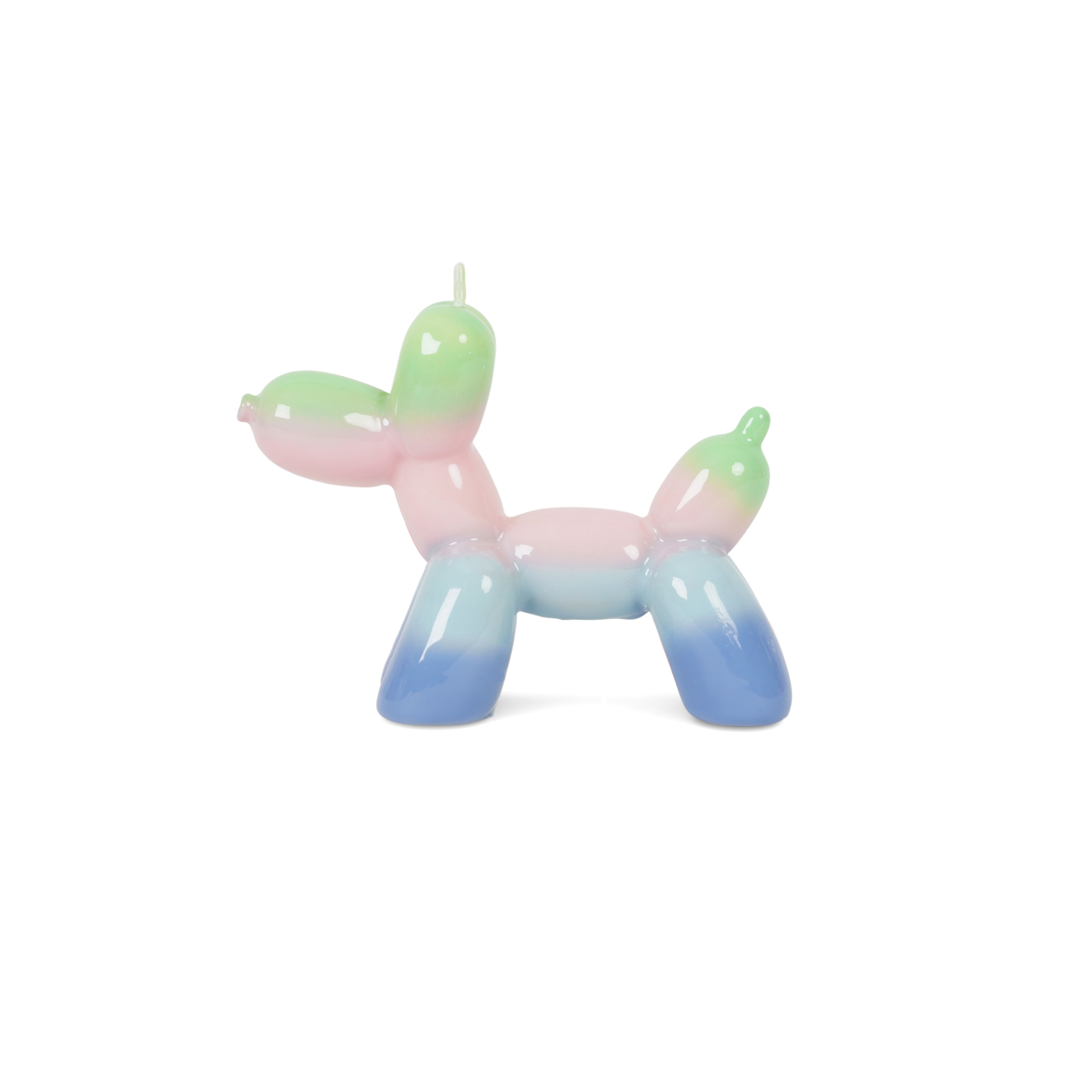 The Balloon Dog Candle - Sunrise features a pastel gradient of green, pink, and blue, resembling a balloon animal dog. Perfect for adding whimsy to your curated gift shop or concept store. Shown against a white background. Gate21.ee