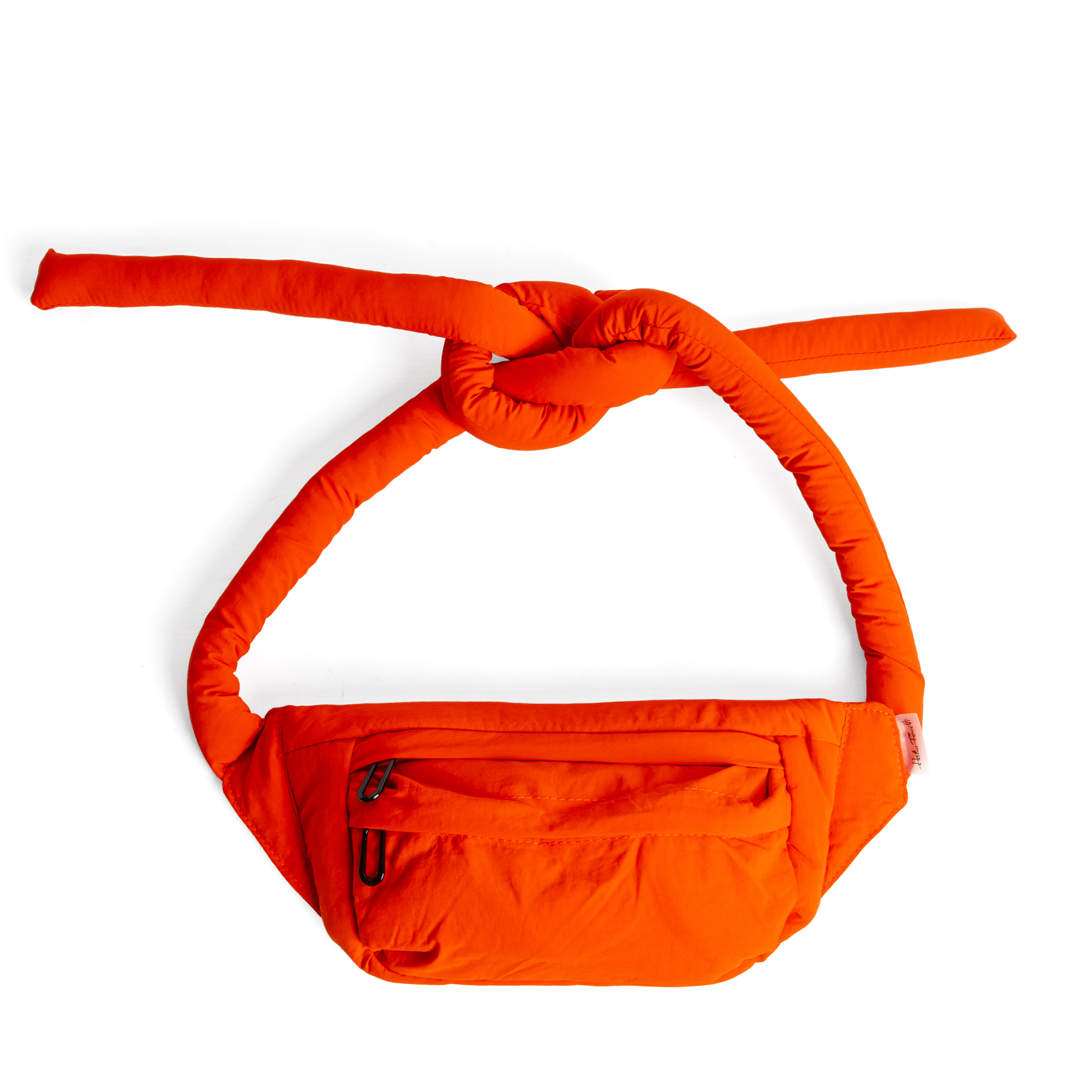 The Knotflex Pack in light blue features a large front zip pocket and a top strap tied in a knot, curated for our gift shop and displayed against a white background. Gate21.ee