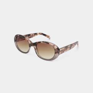 The ANMA - Coquina sunglasses feature a brown tortoiseshell oval frame with graduated brown lenses, stylishly displayed at an angle on a white background—perfect for your next Tallinn shopping trip. Gate21.ee