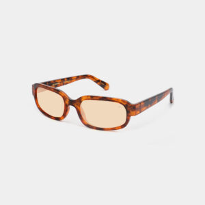 A pair of rectangular A. Kjærbede WILL - Galactic Pink sunglasses with light brown lenses, shown on a plain white background. Gate21.ee
