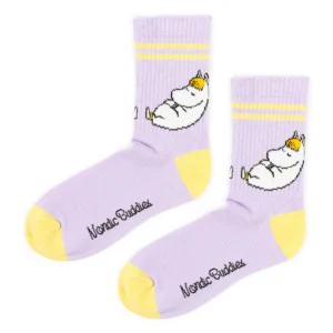 Add a playful touch to your outfit with Moomies Retro Socks K&Otilde;IK&mdash;light purple socks with yellow toes and stripes, a white cartoon hippopotamus, and "Nordic Buddies" embroidery. A fun Estonian gift shop pick for unique style. Gate21.ee