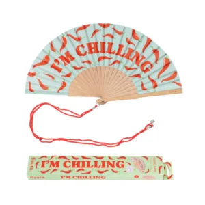 The "I´m chilling" fan features red chilli pepper designs, bold red lettering, a wooden handle, red lanyard, and comes in a matching box—ideal for gift shops or concept stores in Tallinn. Gate21.ee