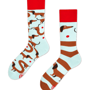 Sausage Dog: A stylish pair of light blue socks with red cuffs—one featuring brown sausage dog patterns and the other with stripes and sausage dog faces—a unique Tallinn gift shop find. Gate21.ee