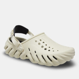 The Crocs™ Echo Clog in Bone/Black features an off-white ventilated upper, black adjustable heel strap, and thick ridged sole, highlighting curated Estonian design against a plain white background. Gate21.ee